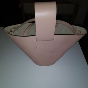 Soft pink leather shoulder bag.